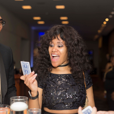 Brian Masters performing strolling magic at a corporate event