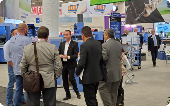 Brian Masters performing strolling magic at a trade show