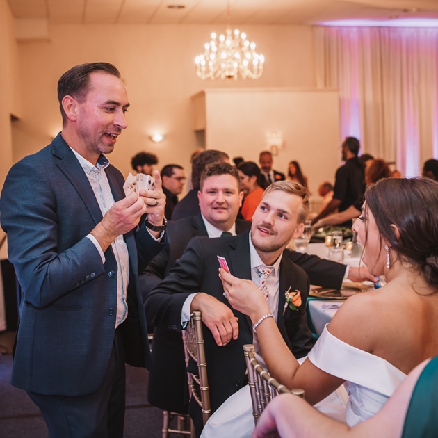 Brian Masters performing strolling magic at a wedding 